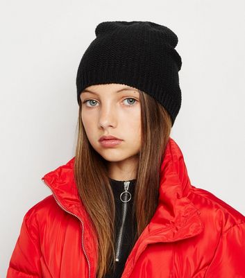 girls black bobble hat