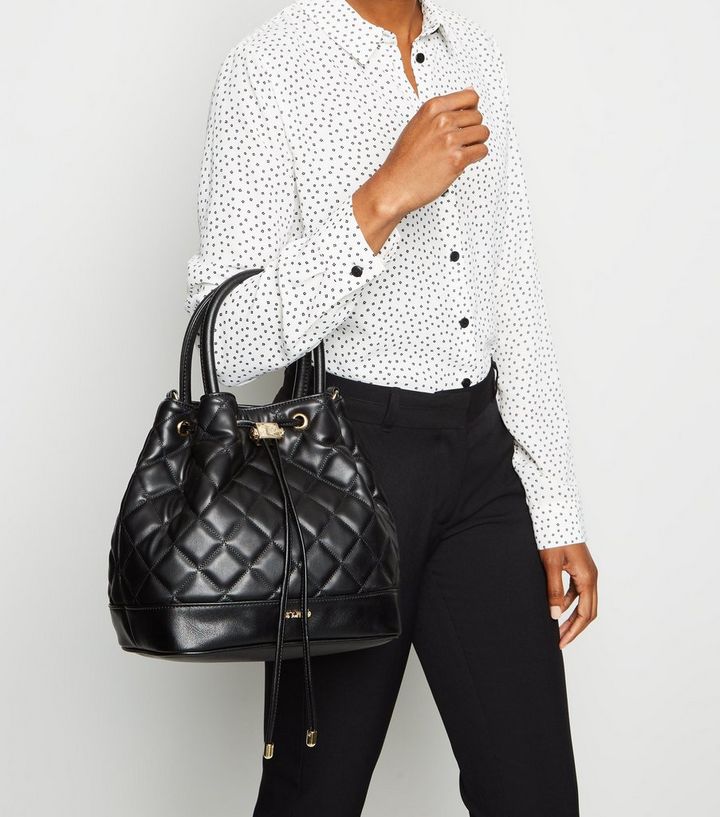 Est 1969 Black Quilted Drawstring Tote Bag Add To Saved Items Remove From Est 1969 Black Quilted Drawstring Tote Bag Add To Saved Items Remove From