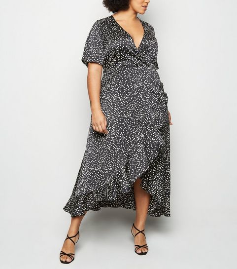 Curves - Robe mi-longue noire portefeuille en satin à pois