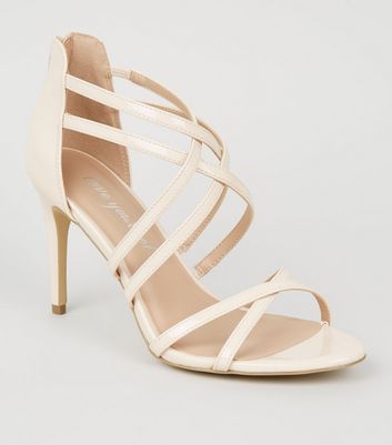 cream patent heels