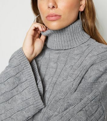 cable knit roll neck jumper womens