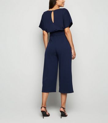 navy batwing jumpsuit