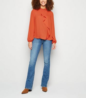 orange high neck blouse