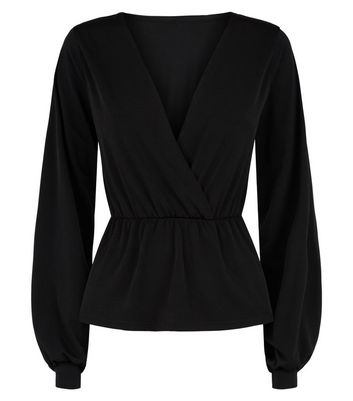 black peplum top with sleeves