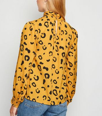 yellow animal print blouse