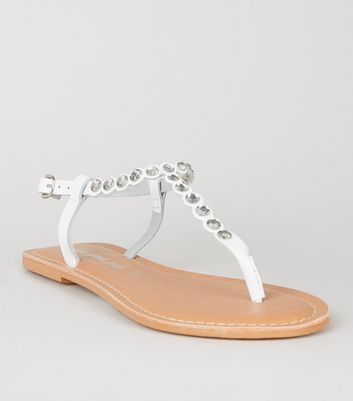 White embellished flat store sandals