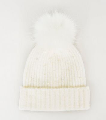 cream bobble hat