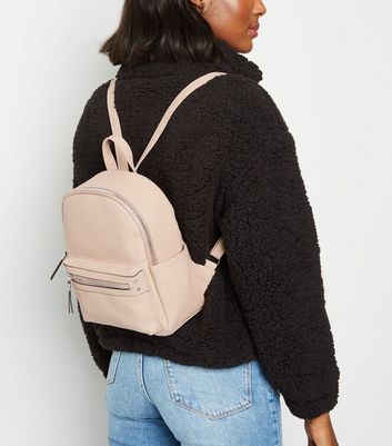 Mini pink 2025 leather backpack