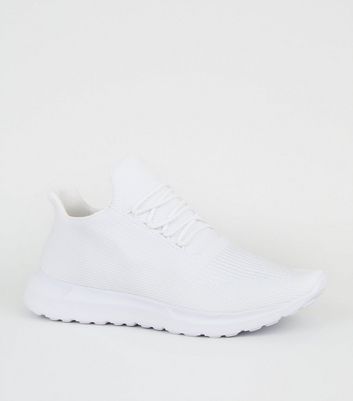 white lightweight trainers