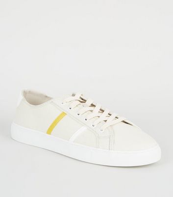 white canvas trainers