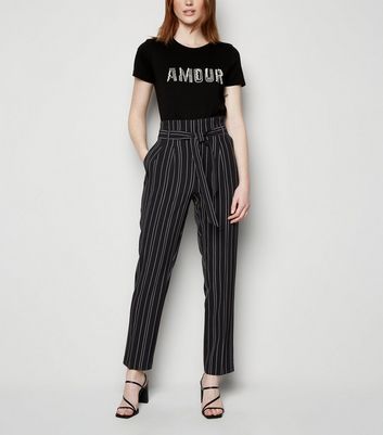 tall black high waisted trousers