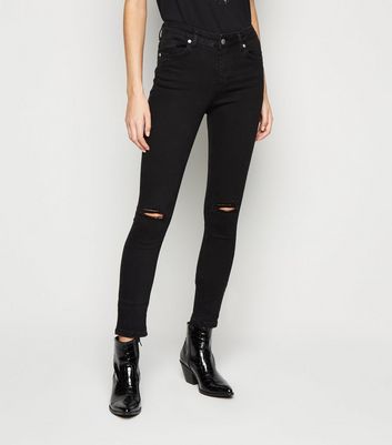 black low rise ripped jeans