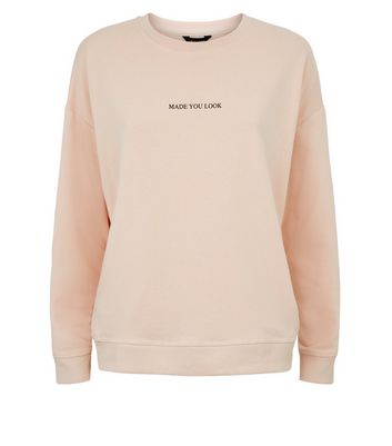 pale pink sweatshirt