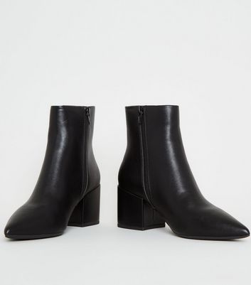 black leather pointed ankle boots