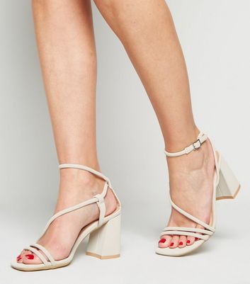 off white flared block heel sandals