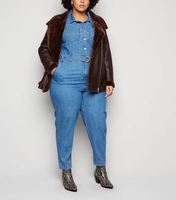 denim jumpsuit with boots