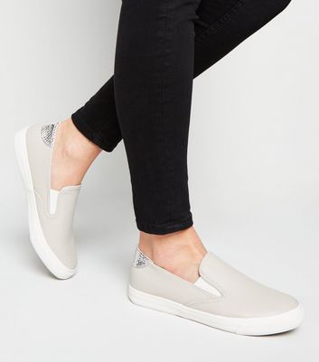 wide fit slip on trainers womens