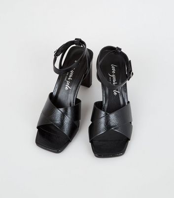 black cross strap sandals