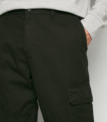 Pantalon noir serré online en bas