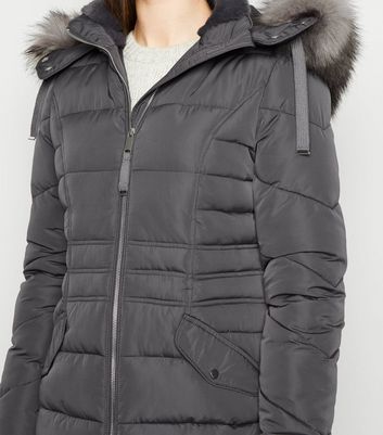 dark grey puffer coat with fur hood