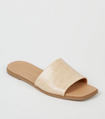 cream sliders womens