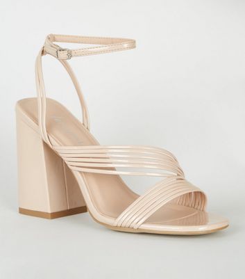 cream patent heels