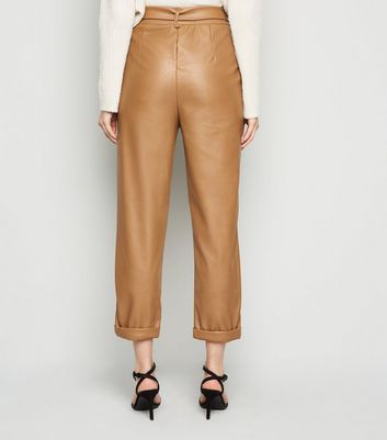 brown leather look trousers