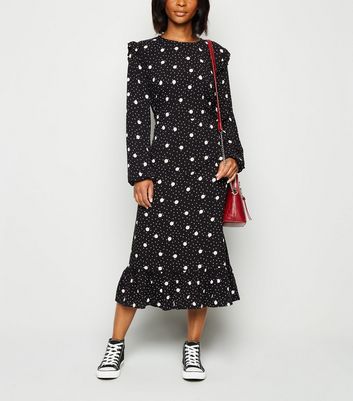 black spotted midi dress