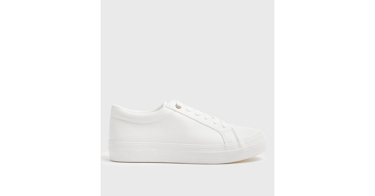 white faux leather flatform trainers