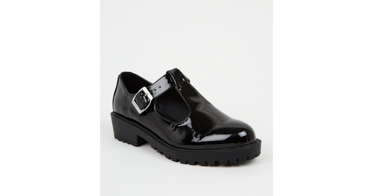 white and black mary jane shoes