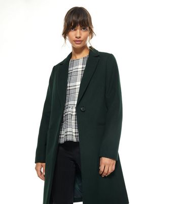 dark green long coat