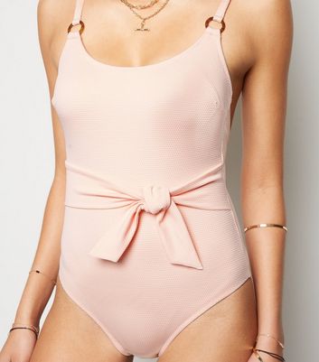 pale pink swimsuit