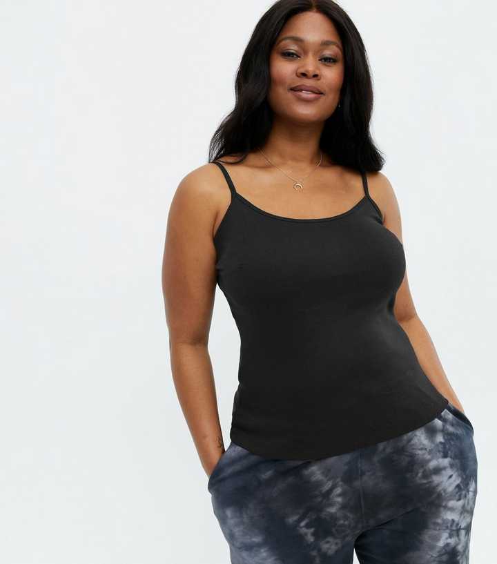 https://media3.newlookassets.com/i/newlook/653900901/womens/clothing/tops/curves-black-longline-strappy-cami.jpg?strip=true&qlt=50&w=720