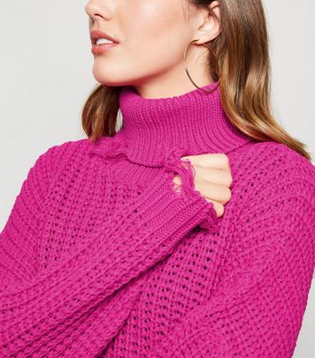 bright pink roll neck jumper