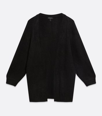 collared shirt under sweater