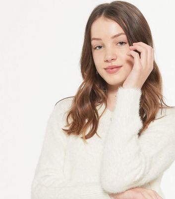 girls white fluffy jumper