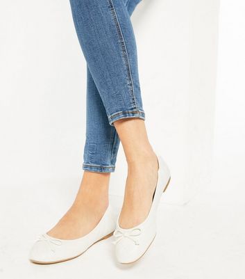 white ballet pumps