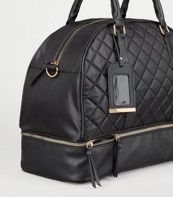 Black quilted 2024 travel bag