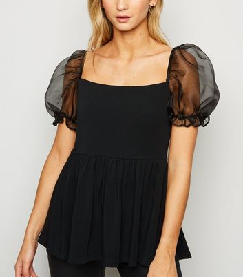 black peplum top with sleeves