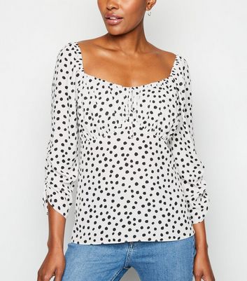 white spot blouse