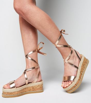 Gold tie store up leg sandals