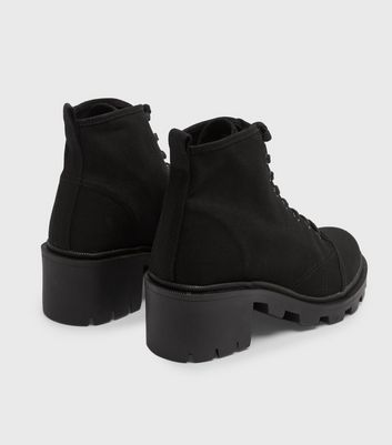 black chunky trainer boots