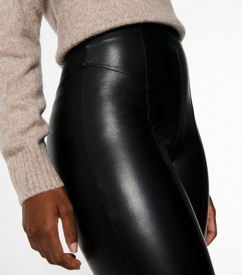 Bershka Tall high waisted faux leather leggings in black