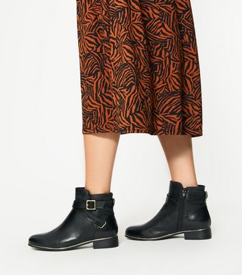 ankle boots with metal trim