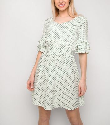 white tea dress with sleeves