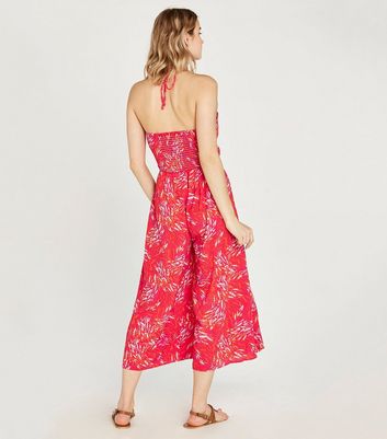 Image of Apricot Bright Pink Tropical Halterneck Jumpsuit New Look