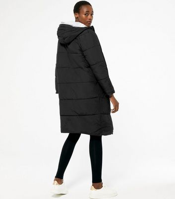 tall black long puffer coat