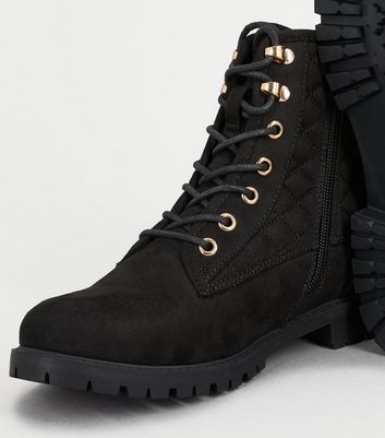 black suedette flat quilted boots