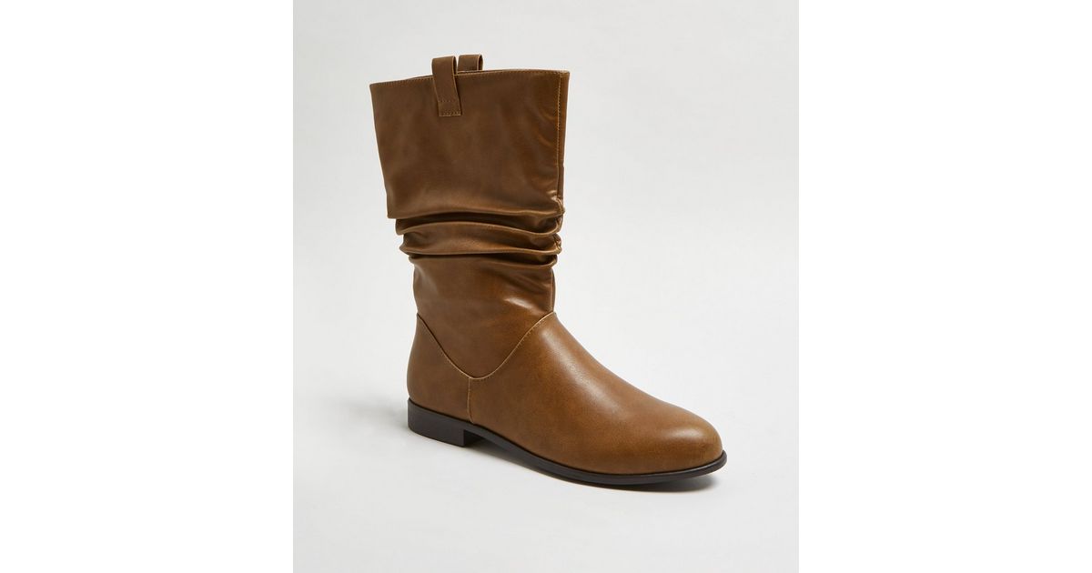 flat tan calf boots
