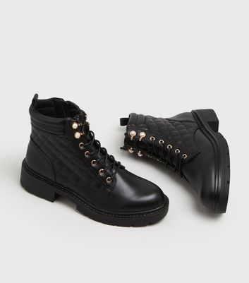 black quilted lace up boots